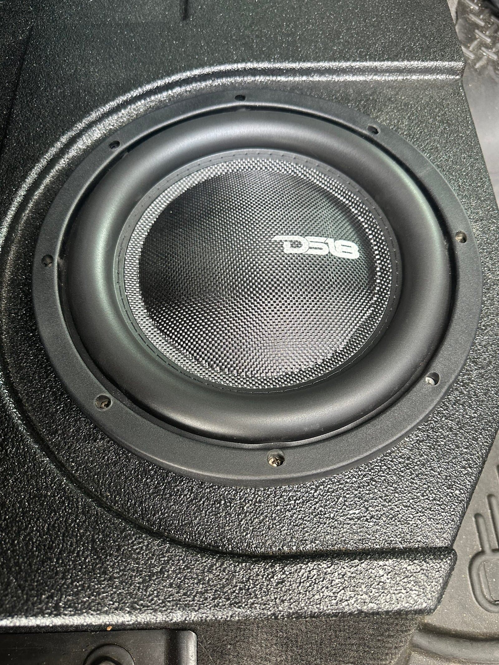 DS18 subwoofer mounted in a custom enclosure